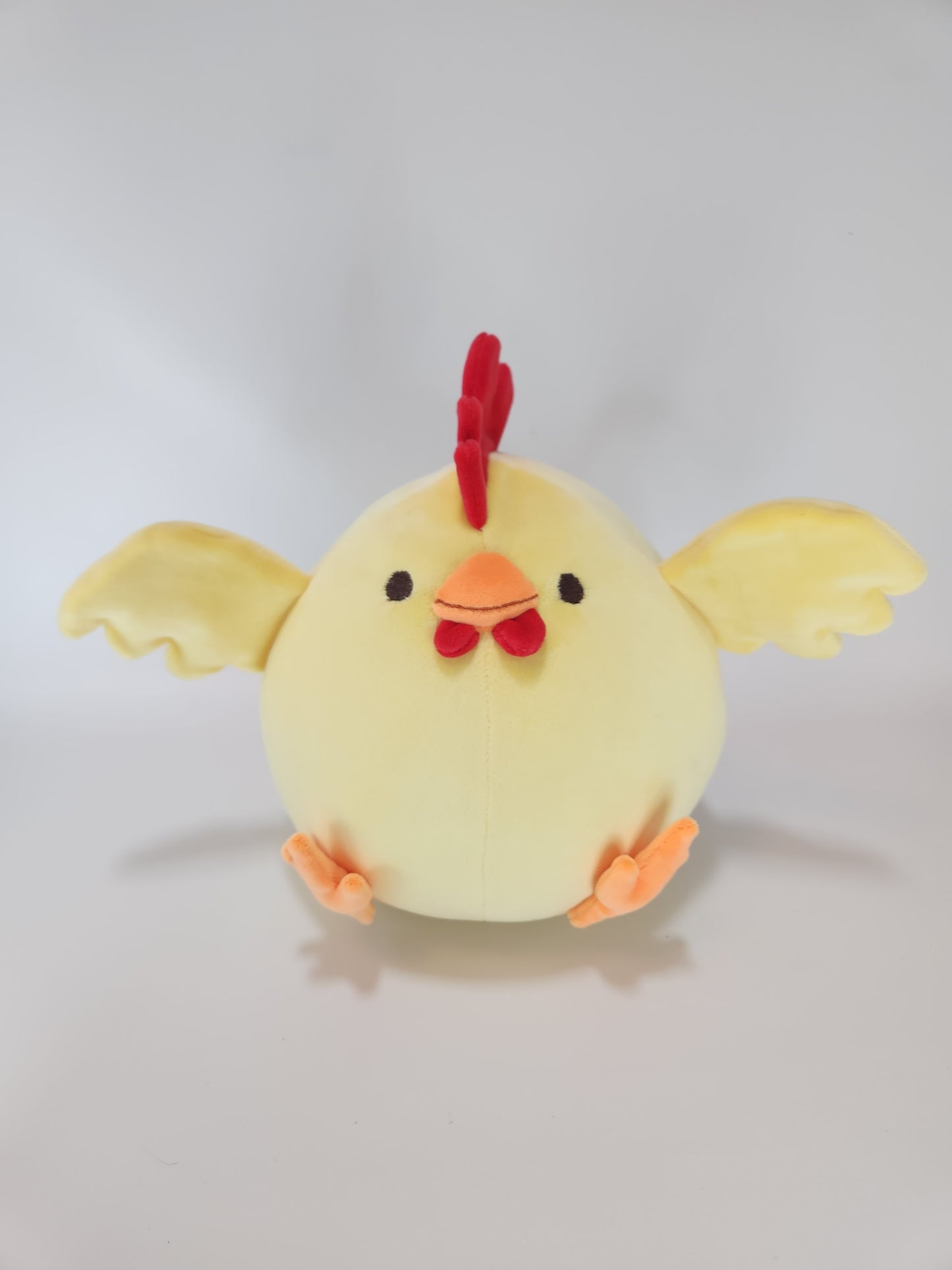 Yellow chonky chicken with hats (mochi)