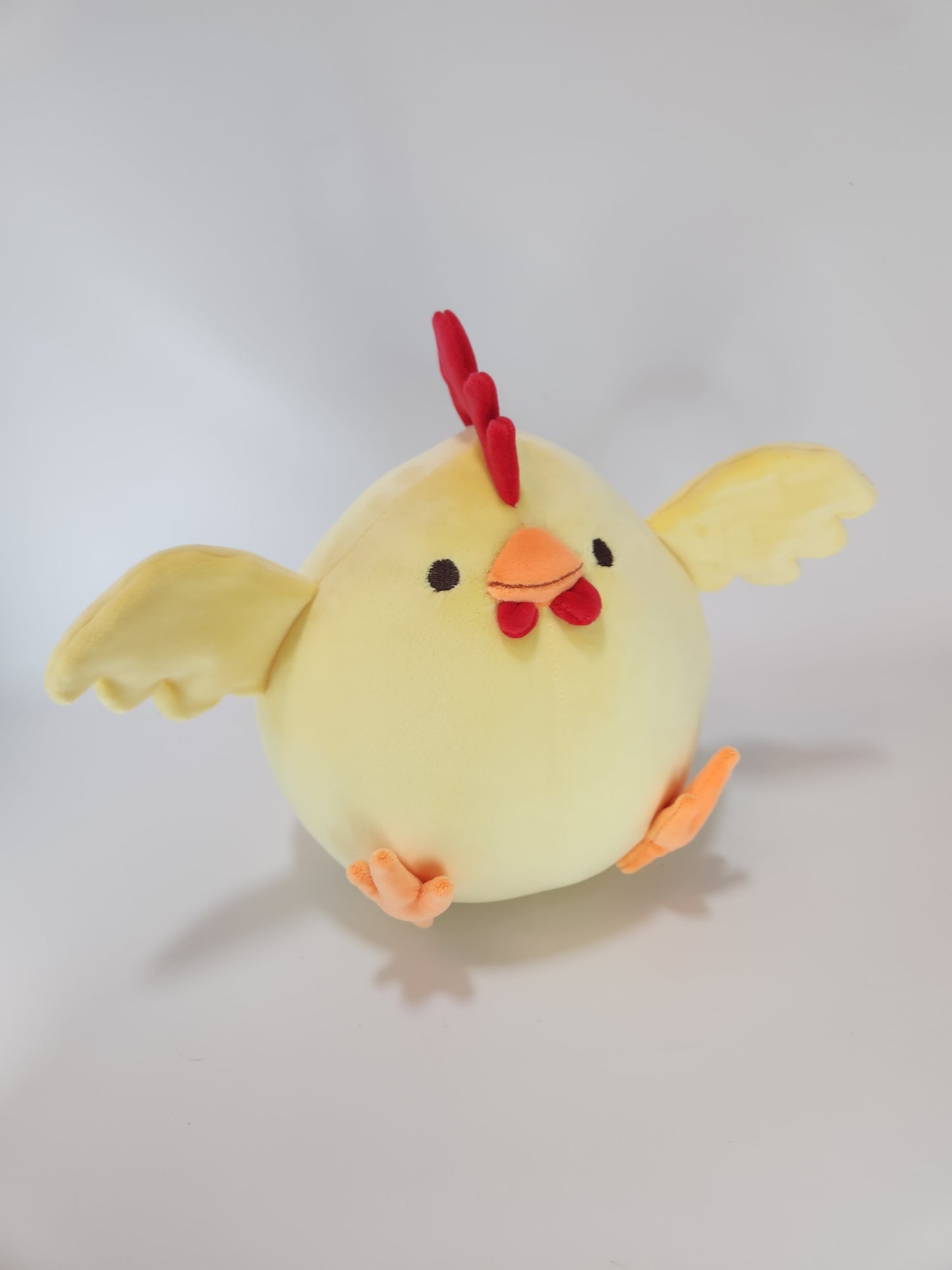 Yellow chonky chicken with hats (mochi)