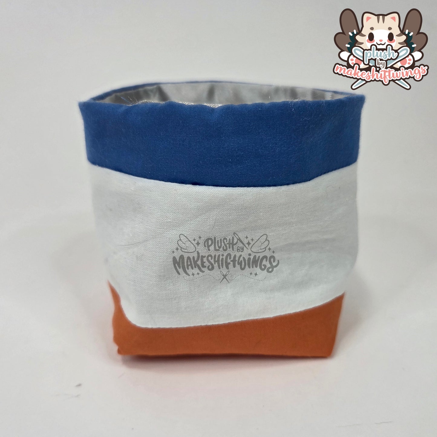 Raccoon in a chip bag (embroidered eyes)