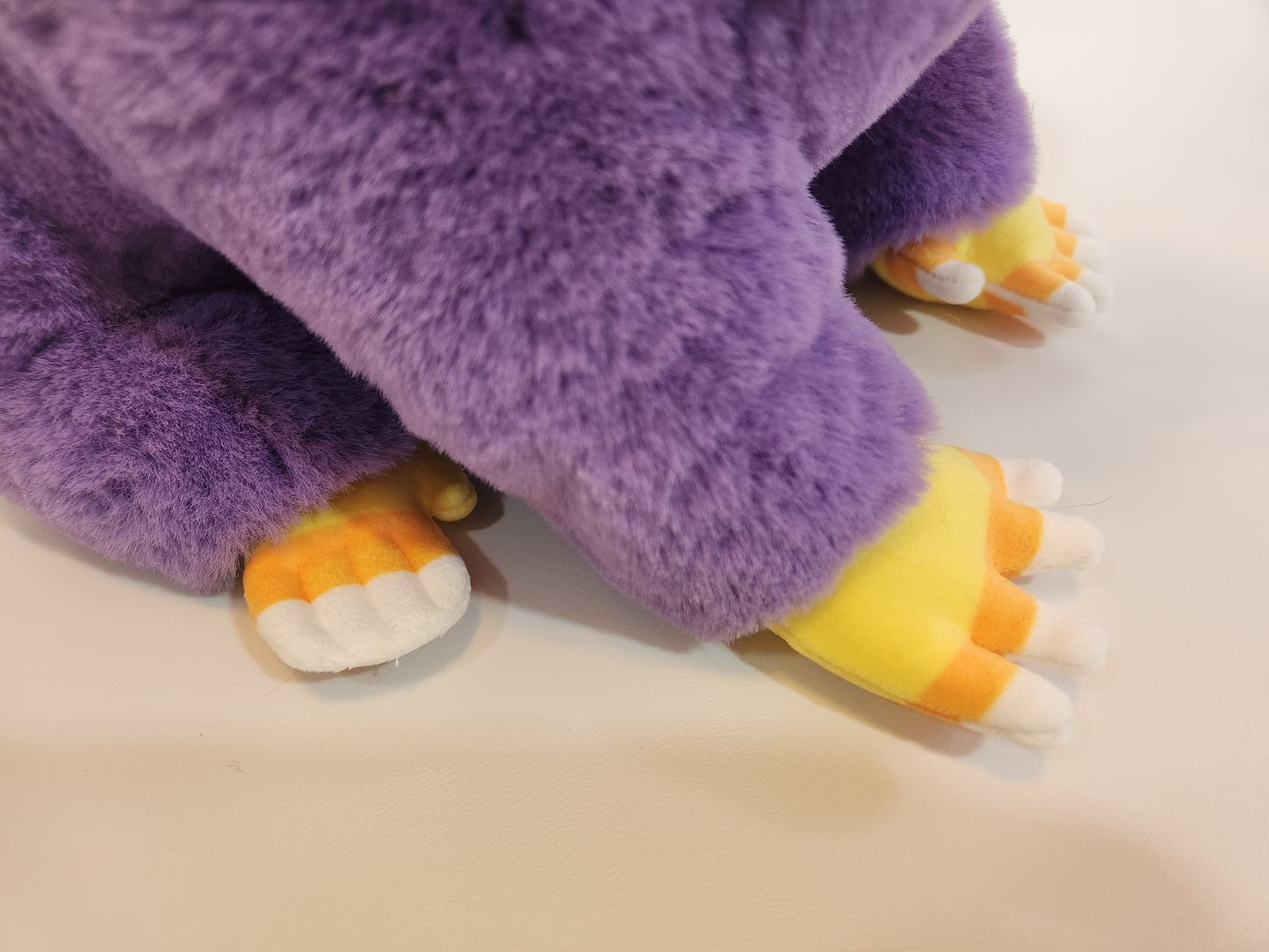 Raccoon plush (purple candy corn)