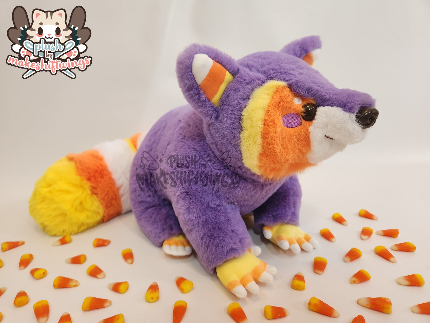 Raccoon plush (purple candy corn)