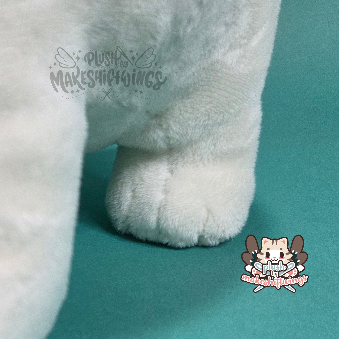 White fat cat in a sweater